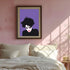 A minimalist portrait of Robert Smith from The Cure against a purple background. The image shows his signature wild black hair, pale white face, and iconic red lipstick in a simplified, high-contrast style. His head is slightly tilted downward in his characteristic brooding pose.