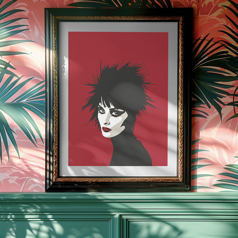 A minimalist portrait of Siouxsie Sioux against a deep red background. The image shows her signature spiky black hair, pale white face, dramatic black eye makeup, and bold red lips in a simplified, high-contrast style. Her face is shown in profile, turned slightly to showcase her distinctive features and punk aesthetic.