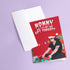 Punk rock Christmas card featuring Glenn Danzig-inspired figure in Santa hat, surrounded by presents. Text reads "Mommmy, can I go out and gift tonight?" Perfect for alternative holiday greetings.