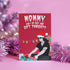 Punk rock Christmas card featuring Glenn Danzig-inspired figure in Santa hat, surrounded by presents. Text reads "Mommmy, can I go out and gift tonight?" Perfect for alternative holiday greetings.