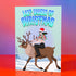 A humorous holiday card featuring an illustration of Glenn Danzig from the Misfits riding a reindeer, wearing a Santa hat and wrapped in Christmas lights. The text at the top reads "Last Caress of Christmas" in icy blue letters, referencing the iconic Misfits song. The background depicts a snowy winter scene, combining punk rock and festive elements for a playful twist.