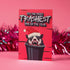A humorous holiday card featuring a cartoon possum popping out of a trash can, wearing a Santa hat with fangs bared. The text at the top reads "It's the most trashiest time of the year," adding a playful and quirky twist to the holiday season.