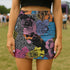 High-waisted mini skirt with a multicolor floral collage print featuring graphic roses, polka dots, and stripes. Bodycon fit in a bright palette including pink, yellow, blue, and orange. Made of stretchy poly-spandex blend and styled in colorful festival outfits. Sizes XS to XL available.
