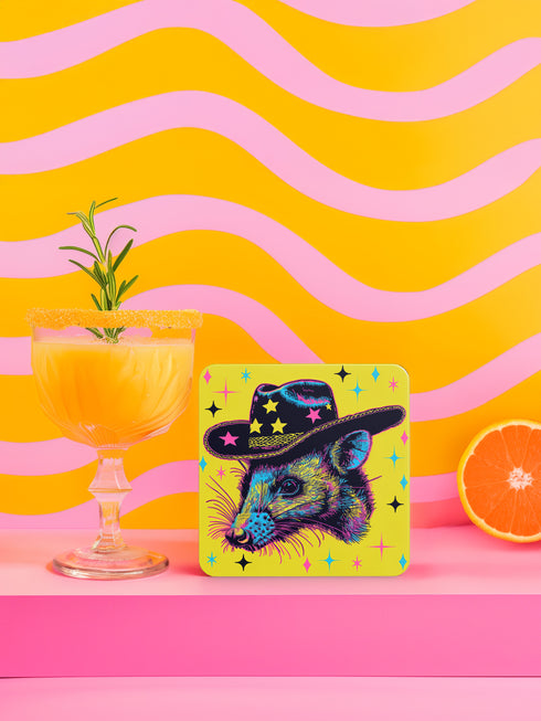 Square coasters featuring psychedelic multicolored possums wearing star-studded cowboy hats against bright neon yellow backgrounds with colorful stars. Weird trash panda drink coasters, funky possum barware, eclectic table decor, maximalist animal accessories.