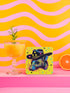 Square coasters featuring psychedelic multicolored possums wearing star-studded cowboy hats against bright neon yellow backgrounds with colorful stars. Weird trash panda drink coasters, funky possum barware, eclectic table decor, maximalist animal accessories.