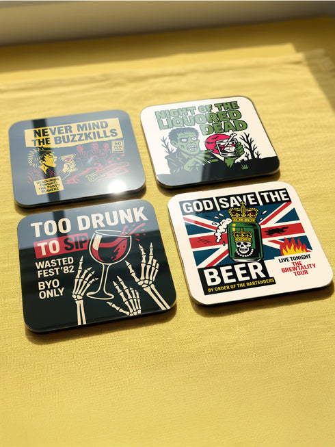A set of four glossy square coasters on a vibrant green surface, each featuring a unique punk rock parody design. Top left: "Never Mind the Buzzkills" in yellow and pink ransom-note typography. Top right: "Night of the Liquored Dead" featuring a green zombie holding a drink in a horror comic style. Bottom left: "Too Drunk To Sip" with skeleton hands holding a wine glass on a black background. Bottom right: "God Save The Beer" featuring a green beer can on a Union Jack flag background.