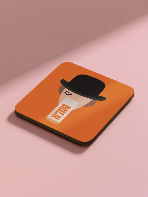 Set of four square coasters featuring iconic imagery from "A Clockwork Orange" in orange and white designs on a pink background.