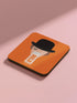 Set of four square coasters featuring iconic imagery from "A Clockwork Orange" in orange and white designs on a pink background.