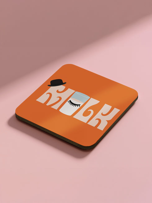 Set of four square coasters featuring iconic imagery from "A Clockwork Orange" in orange and white designs on a pink background.