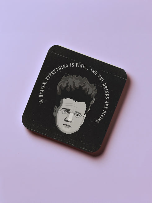 Four-piece horror movie coaster set featuring The Shining and Carrie designs in black, red, and orange with iconic quotes and imagery from the films. Cork-backed hardboard construction.