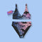 High-waisted bikini set with a gothic twist, featuring black bats flying across a dreamy gradient of pastel purple, pink, and blue spiderwebs. The top has a deep scoop neckline and thick straps, paired with full-coverage bottoms. Perfect for spooky sirens, pastel goths, and Halloween-loving hotties who haunt the beach year-round.