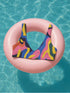 Scoop-neck bikini top with wide straps, featuring a bold psychedelic wave print in pink, yellow, blue, orange, and navy. Designed in a sports-bra style silhouette with supportive coverage and a vibrant Y2K vibe. Floating against a turquoise pool background, this top brings festival energy, dopamine brights, and funky retro flair to your swimwear drawer.