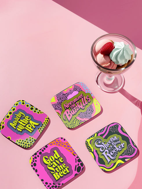A four-piece punk rock-inspired coaster set featuring neon pink, yellow, and black designs with bold typography and chaotic patterns.
