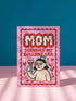 A 5x7 inch flat-printed pink greeting card featuring a cherry red scalloped border. At the top, bold wavy cream letters outlined in red read MOM. Below, red text says SURVIVED MY BULLSHIT ERA surrounded by small stars and hearts. The center illustration shows a smirking figure with black hair wearing small crown and holding a heart-shaped glass of \wine, outlined in light teal. The inside features black serif text: Bullshit era survivor award: you. Grateful you didn't quit on me. Love you, Mom.