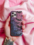 A pastel gothic phone case featuring black bat silhouettes over a gradient pink-to-blue ombré background with web-like detailing. Available for iPhone, Samsung, and Google Pixel models in matte or glossy finishes with dual-layer protection.