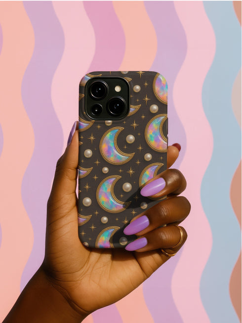 Matte or glossy phone case featuring holographic crescent moons, gold stars, and pearl accents on a black background; available for iPhone, Samsung, and Pixel models