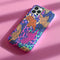 Vibrant phone case with orange tigers on colorful abstract background. Maximalist design featuring multiple tigers and bold purple, pink, and blue patterns. Copy