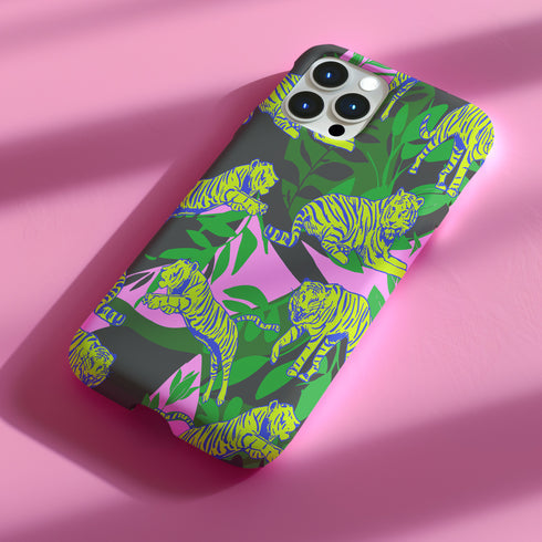 Colorful maximalist phone case with electric yellow tigers prowling through lush green tropical foliage. Psychedelic jungle theme on a purple backdrop. Bold summer design.