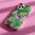 Colorful maximalist phone case with electric yellow tigers prowling through lush green tropical foliage. Psychedelic jungle theme on a purple backdrop. Bold summer design.
