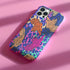 Vibrant phone case with orange tigers on colorful abstract background. Maximalist design featuring multiple tigers and bold purple, pink, and blue patterns. Copy