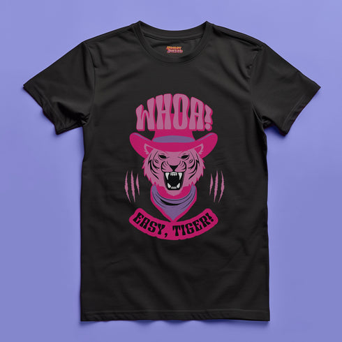 Unisex t-shirt featuring a pink tiger in purple hat and bandana, with "WHOA!" and "EASY TIGER!" text in bold retro style. Available in black and white, sizes S-3XL