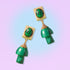 Luxurious earrings featuring gold rectangular studs with oval malachite stones, dangling vibrant green mushroom-shaped malachite charms, perfect for cottagecore aesthetics.