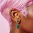 Luxurious earrings featuring gold rectangular studs with oval malachite stones, dangling vibrant green mushroom-shaped malachite charms, perfect for cottagecore aesthetics.