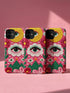 Maximalist phone case with a vibrant hot pink background featuring a faux crochet knit texture illusion. The design includes a large yellow crescent moon with a green eye in the top right, a central white cloud with a green eye and red lashes, and green mountain peaks at the bottom. Red flowers and pink swirling mist accent the scene.