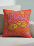 A vibrant tomato red square throw pillow featuring a retro 70s Pisces zodiac design in a faux embroidery print style. The word Pisces appears in bubblegum pink bubble letters at the top, sitting above two yellow and pink fish swimming in a circle representing the water sign. The background is densely filled with yellow and pink daisies. The texture visually mimics stitched needlework but is a smooth 2D print on linen-feel fabric. Perfect for maximalist, eclectic, and dopamine decor styles.