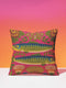A square throw pillow cover featuring a symmetrical maximalist design on a hot pink background. Two stylized green and blue sardines swim in opposite directions in the center, featuring detailed scales and yellow eyes. The fish are surrounded by a folk art style pattern of green leafy vines and stylized orange and yellow flowers at the corners. The fabric has a faux linen texture with a flat printed design that mimics the look of vintage embroidery. Vibrant colors include pink, green, blue.