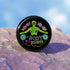 Round black pinback button featuring lime green female figure with outstretched arms and purple floral details, surrounded by pink flowers and blue blooms with multicolored "MY BODY MY RIGHTS" text. Folk art feminist pin with glossy finish and safety pin backing in 2" and 3" sizes.