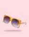Oversized mod square sunglasses with chunky frames and gradient polycarbonate lenses, providing UV400 protection. Fashion shades in three colorways—gloss black, classic tortoise, and translucent orange—styled in a retro 70s, Jackie-O inspired silhouette. Lightweight, comfortable fit for everyday wear, festivals, and street style. Statement sunglasses by Honey Dazed for alt, maximalist fashion lovers.