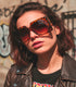 Oversized mod square sunglasses with chunky frames and gradient polycarbonate lenses, providing UV400 protection. Fashion shades in three colorways—gloss black, classic tortoise, and translucent orange—styled in a retro 70s, Jackie-O inspired silhouette. Lightweight, comfortable fit for everyday wear, festivals, and street style. Statement sunglasses by Honey Dazed for alt, maximalist fashion lovers.