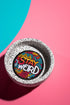 A round embroidered patch with a black background featuring the phrase “STAY WEIRD” in bold, multicolored lettering. "STAY" is stitched in a gradient of red, orange, and yellow, while "WEIRD" is in white. Surrounding the text are wavy, neon-like lines in blue, pink, yellow, and orange, creating a vibrant, psychedelic effect. The patch has a thick black border and is designed for iron-on or sew-on application, making it perfect for jackets, backpacks, denim, and accessories.
