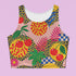 Vibrant Y2K maximalist crop top featuring bold tropical pineapples, leopard print, sweet cherries, and geometric patterns in bright yellow, pink, green, and blue colors. Perfect festival rave wear, alternative fashion, and retro summer styling for women who love aesthetic streetwear and unique party outfits