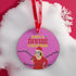 Round purple metal Christmas ornament featuring Drag Queen Divine in Santa hat and red dress with colored Christmas lights. Text reads "Have A Divine Christmas" in retro psychedelic lettering.