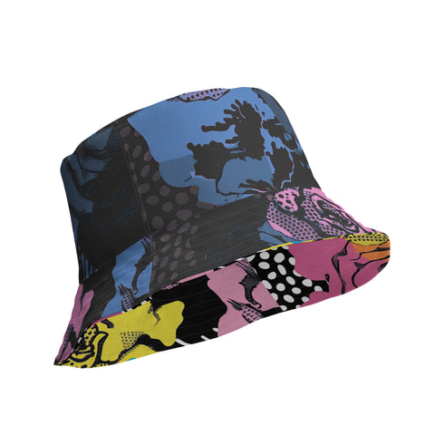 Abstract pop art floral bucket hat featuring a vibrant and bold artistic design with colorful floral motifs in bright pink, orange, yellow, blue, and black tones. The design showcases oversized abstract flowers, coral-like organic shapes, and decorative patterns with dots and stripes in a contemporary pop art style. Made from 100% polyester with textured linen feel, this moisture-wicking and breathable unisex hat is available in XS, S/M, and L/XL sizes, perfect for festivals, streetwear, and artistic fashio