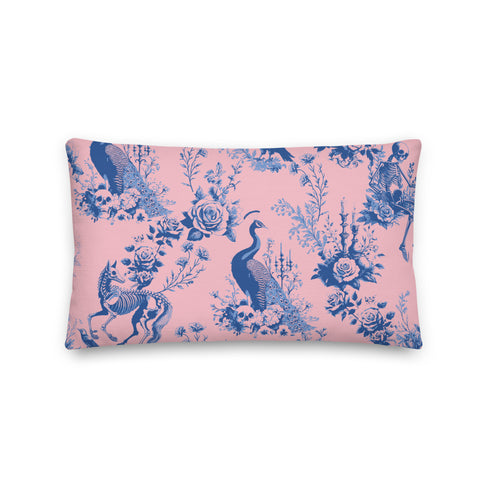 Luxury throw pillow cover featuring a gothic toile pattern in deep blue on a soft pink background, with skeletal figures, peacocks, and floral motifs.