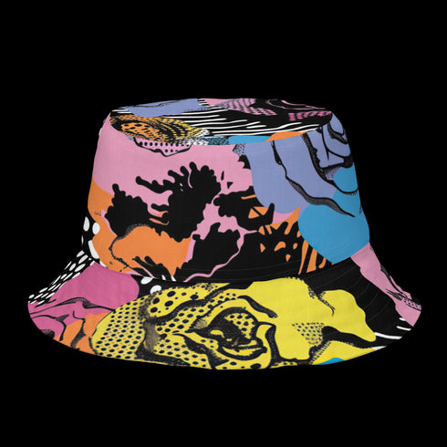 Abstract pop art floral bucket hat featuring a vibrant and bold artistic design with colorful floral motifs in bright pink, orange, yellow, blue, and black tones. The design showcases oversized abstract flowers, coral-like organic shapes, and decorative patterns with dots and stripes in a contemporary pop art style. Made from 100% polyester with textured linen feel, this moisture-wicking and breathable unisex hat is available in XS, S/M, and L/XL sizes, perfect for festivals, streetwear, and artistic fashio