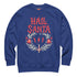 A unisex crewneck sweatshirt shown in red, green, and blue color options. The graphic features "HAIL SANTA" in a red, jagged, heavy metal-style font. The text is framed by a cream-colored wreath made of thorny branches. Inside the wreath are two red lightning bolts and two red bells with cream-colored pentagrams. An inverted candy cane cross sits at the bottom. This alternative holiday sweater has fleece texture, ribbed cuffs, and a classic fit, designed for goth, punk, and metalhead aesthetics.