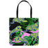 Tote bag with black handles featuring vibrant yellow and blue tigers on a background of pink and black with green foliage