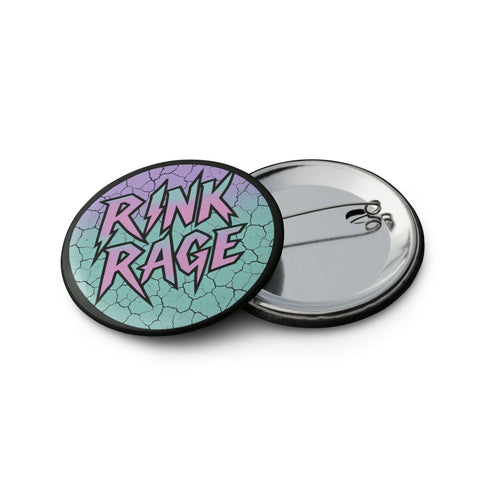 A set of five round 2.25-inch pinback buttons featuring original roller derby designs including a bruised face, saint on skates, flaming roller skate, skull in helmet, and bold text phrases like “Built for Bruises” and “Hell on Wheels.” Each button has a glossy black finish with vibrant pastel pink, purple, mint, and aqua artwork, mounted on metal tinplate with a safety pin back.