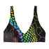 Sports-bra-style bikini top with wide straps and scoop neckline, featuring a vibrant holographic snake print in neon yellow, pink, purple, and blue tones over black. Hexagon pattern overlays add a cyber-sleek finish. Floating above a turquoise pool, this statement swim top brings futuristic Y2K energy to any swimwear collection. Ideal for alt baddies, rave queens, and dopamine dressers.