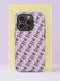 Front view of a dual layer tough phone case printed edge to edge with a coquette cherry pattern on a pale blush pink background. Pairs of shiny lavender gray cherries hang from dark stems tied with tiny bows, set in neat diagonal rows across the case, with small pink rose motifs tucked between them. Soft, sweet, and a little vintage, like a fancy candy shop wallpaper. Coquette pastel cherry phone accessory with open ports and a precise camera cutout.