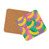 Square drink coaster featuring a playful banana print with bold yellow bananas over a pastel pink, purple, and green abstract background. Made of durable hardboard MDF with a cork backing and a glossy protective topcoat. Measures 3.74 by 3.74 inches, water-repellent and heat-resistant. Perfect for fruit-themed, retro, Y2K, coquette, or dopamine-core decor styles.