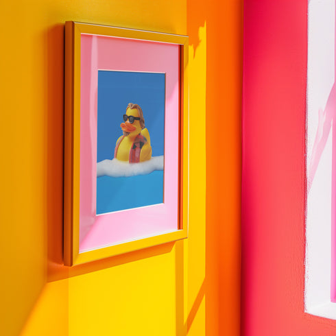 a picture of a rubber ducky on a wall