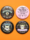 A collection of four retro-style 1.75 inch pinback buttons featuring the text "Tax the Rich" and "Pet the Dogs." Designs include: 1) A black pin with a crystal ball and gold filigree, 2) A pink pin with floral accents and a happy dog, 3) A black pin with a spooky chihuahua holding a bone, and 4) A black pin with a cute devil-horned puppy and lavender banner. High-gloss finish with psychedelic 70s typography. Perfect for battle vests or backpacks. Funny anti-capitalist dog lover gift.