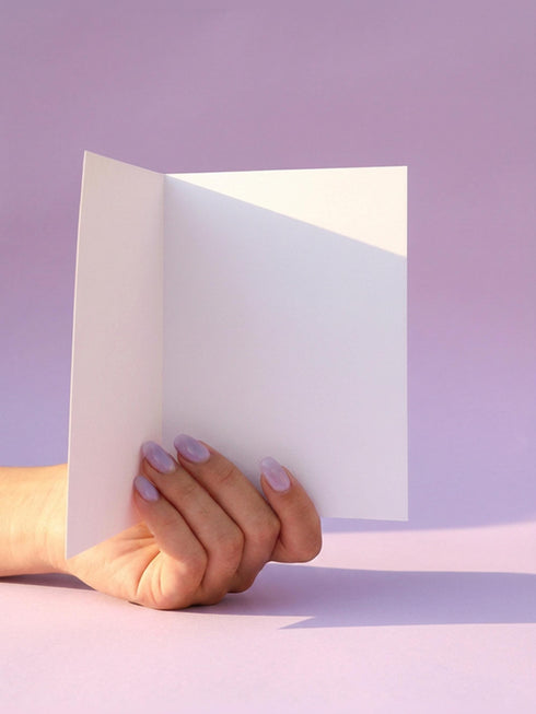 Realistic anatomical heart illustration printed in high contrast ink on a premium 5x7 inch shimmery pearlescent greeting card. The biological heart drawing features detailed arteries, veins, and ventricles, styled with a vintage medical or folk art aesthetic. The cardstock has a visible iridescent sheen. Blank inside valentine card shown with a white peel and seal envelope. Perfect for gothic decor, medical student gifts, cardiology nurse appreciation, and dark academia stationery collections.