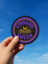 3-inch round embroidered iron-on patch in a cotton–polyester blend; black base with purple ring and gold accent ring; open book, gold crescent moon, tiny stars; curved purple text reads “LIBRARY COVEN”; merrowed edge. Witchy book lover patch for librarians, dark academia, and BookTok covens; makes a great gift for readers, witches, and spooky library pals.