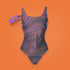 a swimsuit with a tag on an orange background